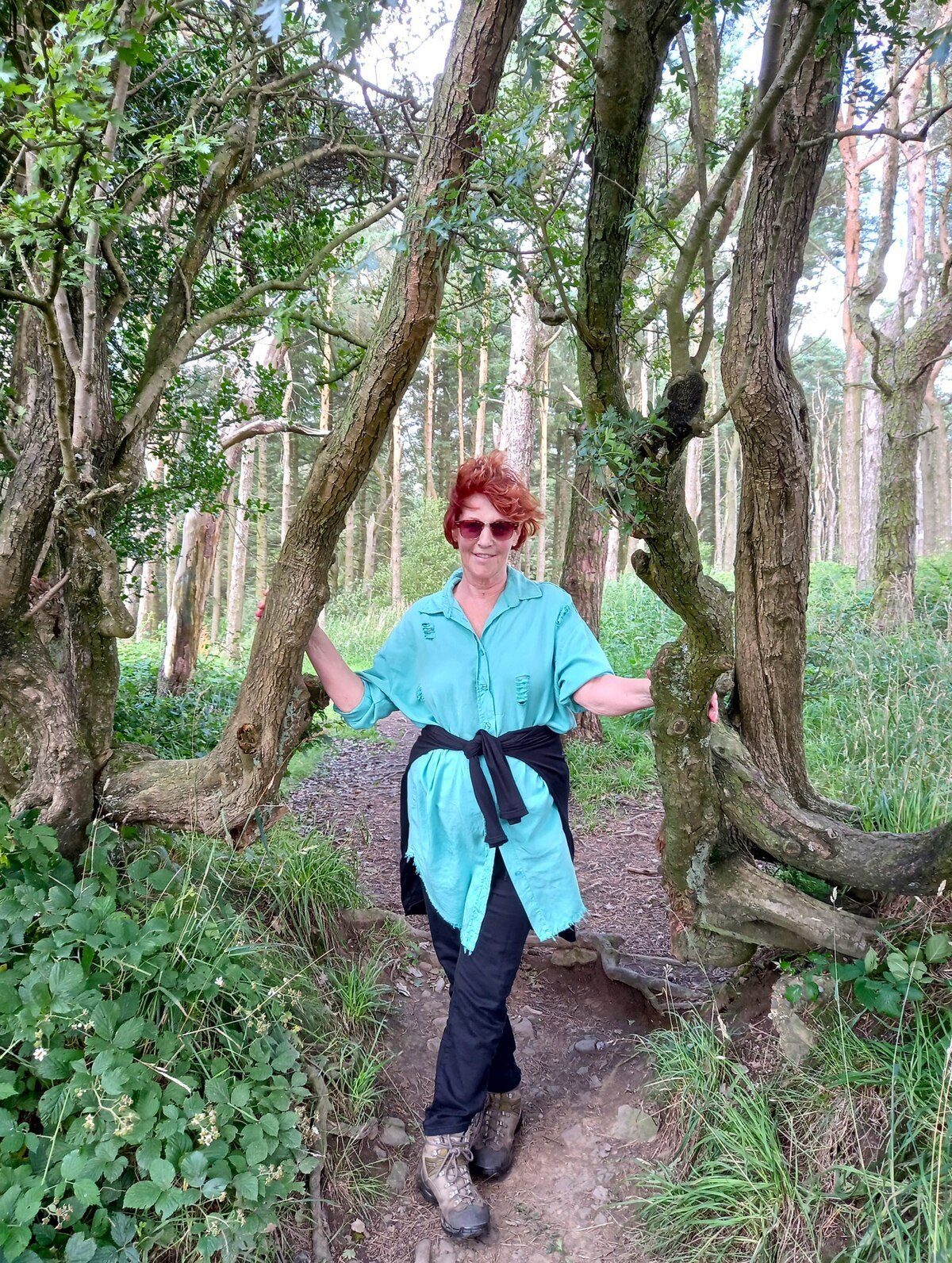 Louise Garman in the woodland setting of the Human Nature exhibition