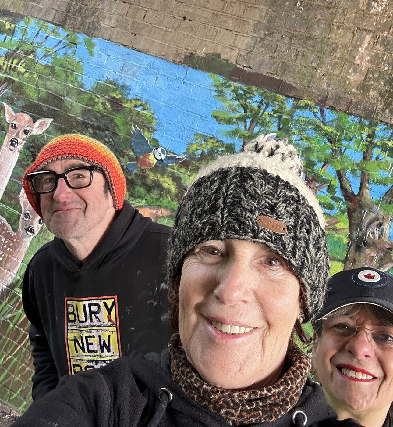 Selfie in front of the completed mural